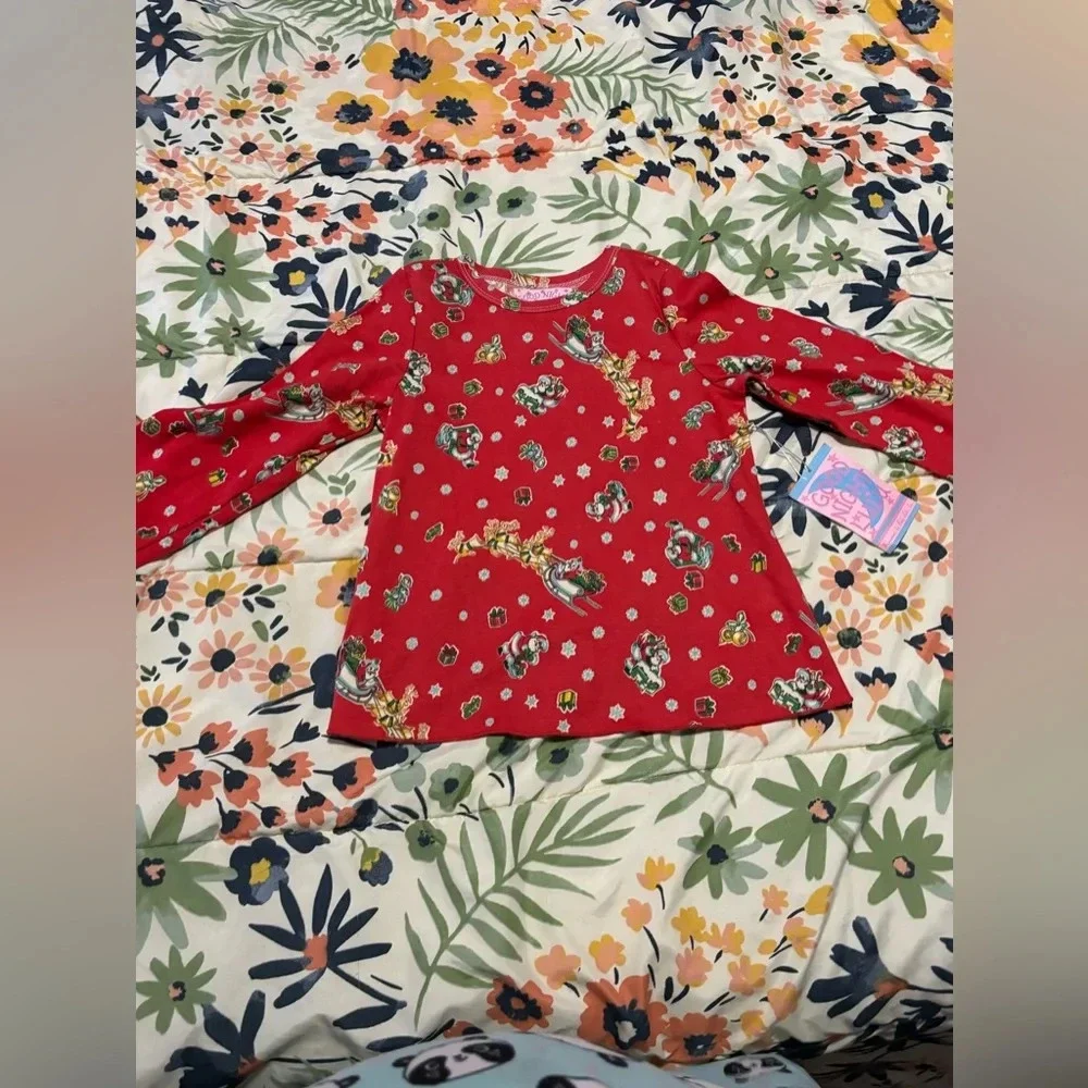 Christmas kids sleep shirt. No pants included. New with tags size 10
